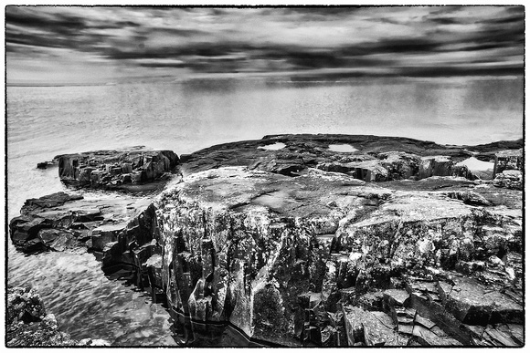 Ancient Basalt Rock and Lake Superior in B&W at Artists' Point - Grand Marais, MN